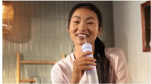 Фото: Іригатор Philips Sonicare Compact Flosser 1000 (HX3333/23) № 13 | KTC